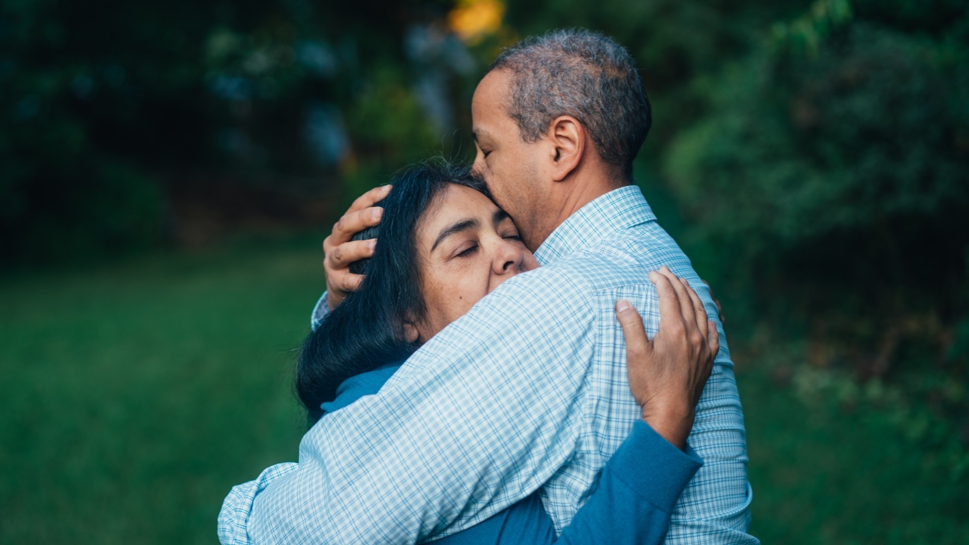 Man consoling woman.