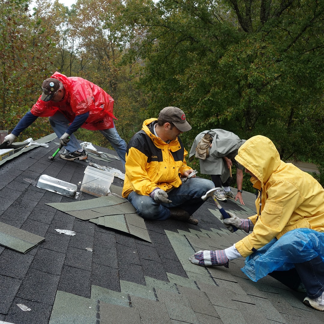 Volunteers fixing a roof in Appalachia.