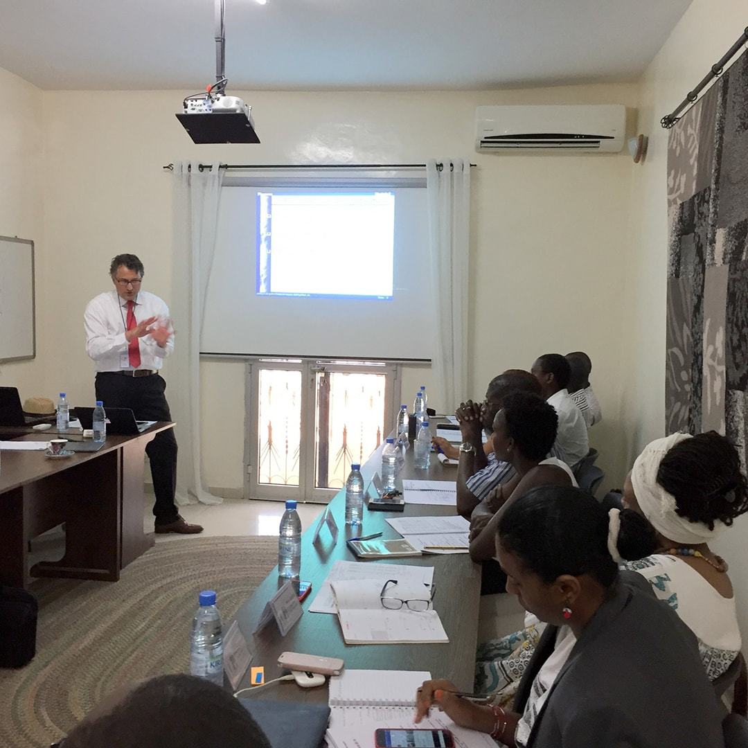 Volunteer presenting a business seminar in Africa.